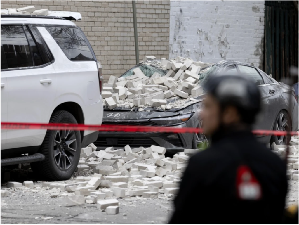 蒙特利尔建筑外墙突然部分坍塌 砸中两辆车 一人受伤